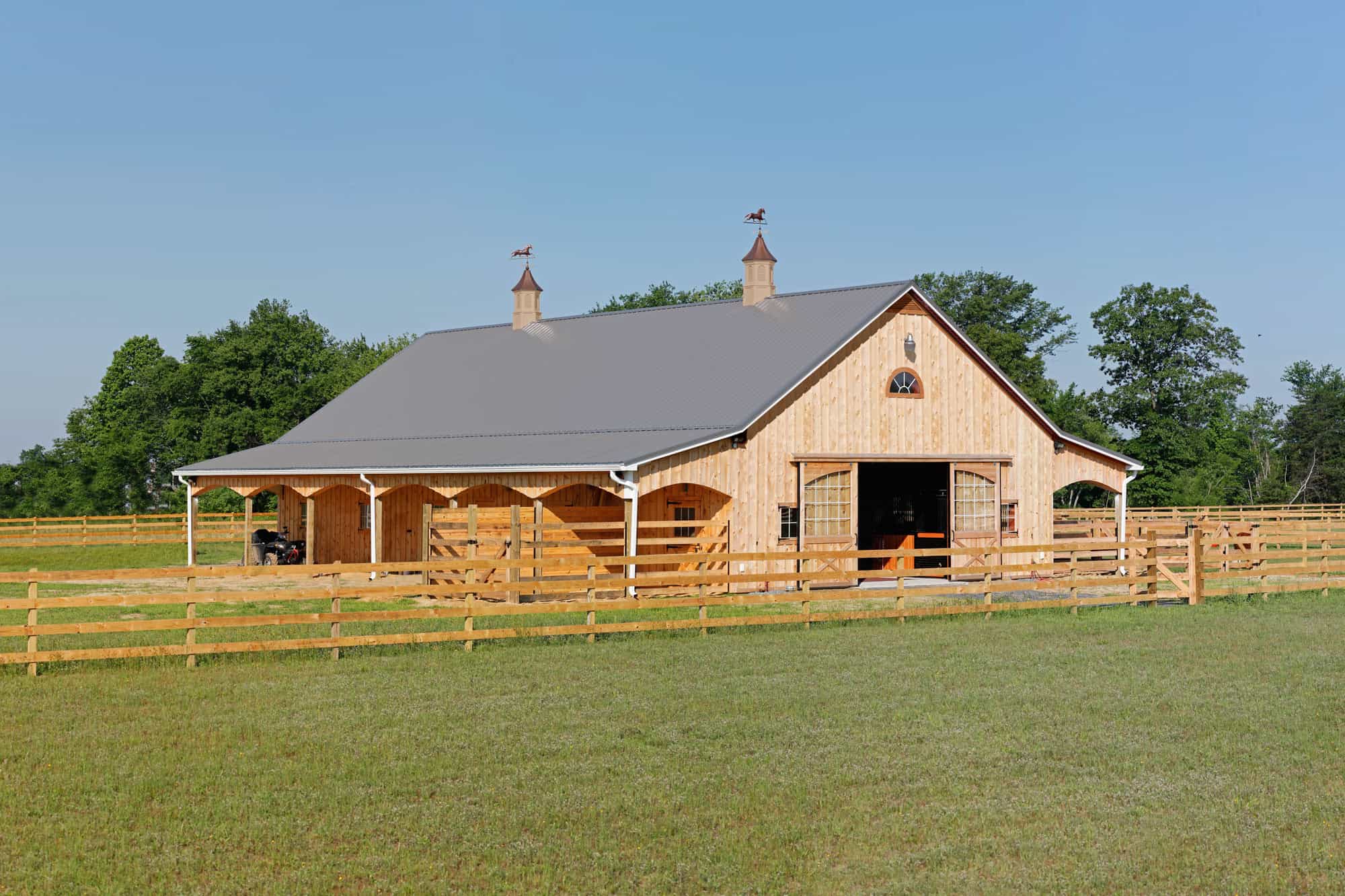 natural wood barn door cupola horse stalls