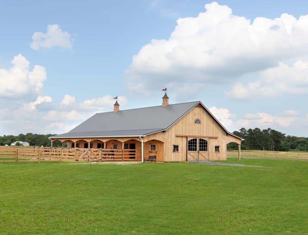 Traditional wooden barn with modern amenities for events and farm uses.