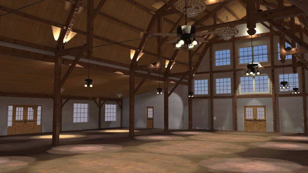Interior of a spacious barn-like structure with wooden beams and high ceilings.