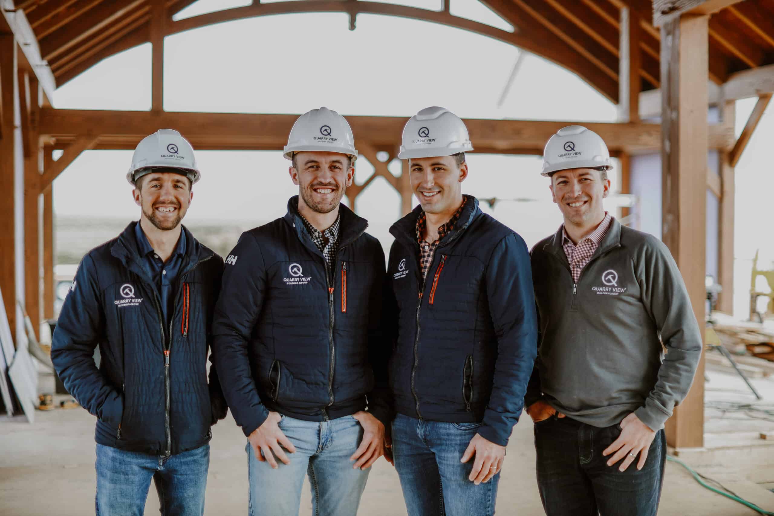 Quarry View owners in front of timber frame construction