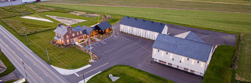 Aerial view of Quarry View Building Group's commercial and residential construction project showcasing modern buildings and landscaped surroundings.