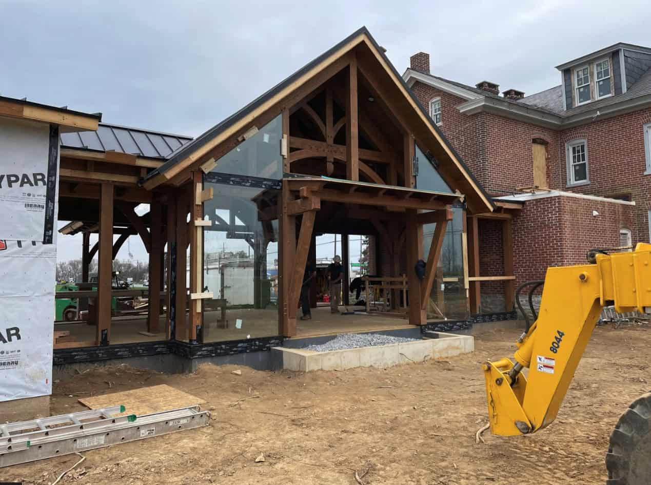 timber frame curtain wall under construction