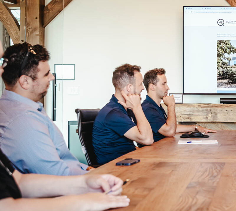 team meeting in timber frame conference room