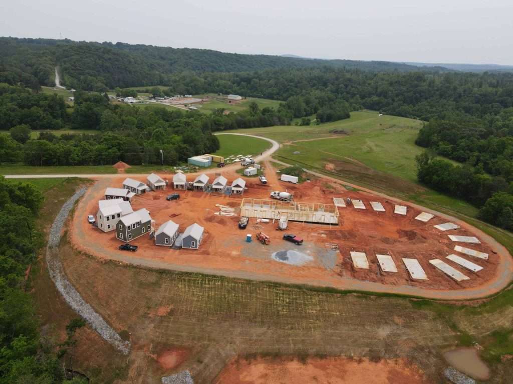 Aerial view of new custom home construction site in Quarry View, showcasing modern design and building progress.