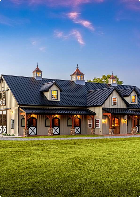 Modern barn-style construction building exterior.