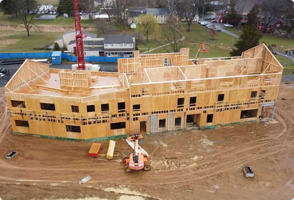 Construction site of a residential building under construction.