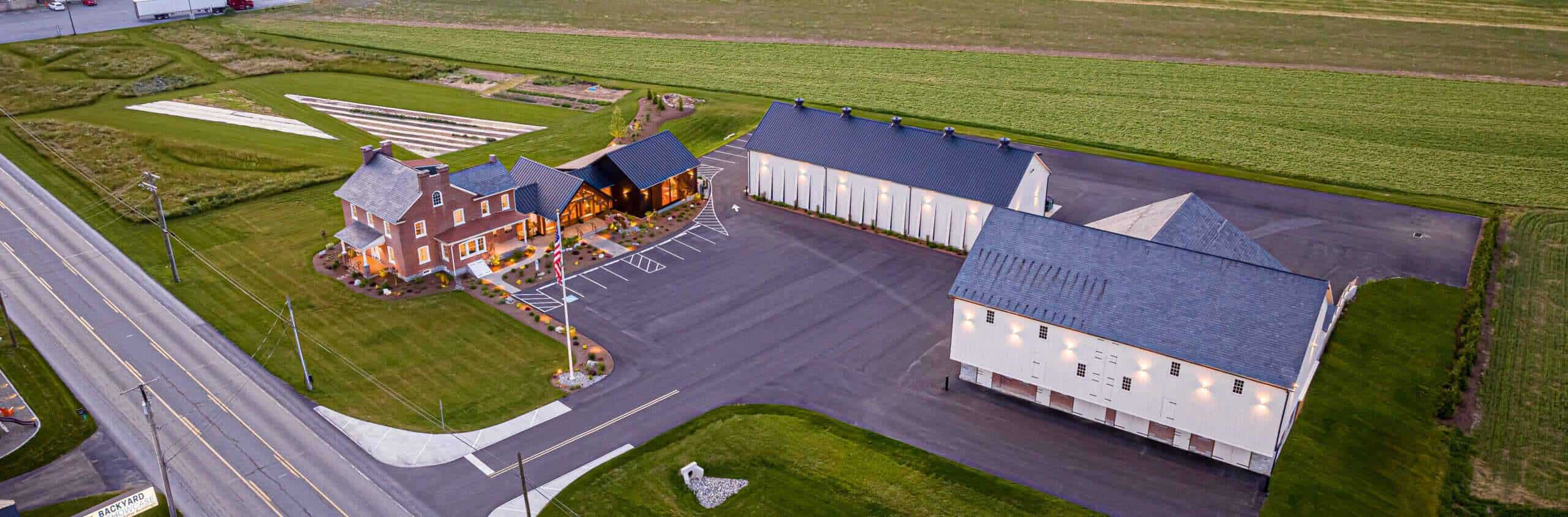 Aerial view of Quarry View Building Group's project with commercial buildings and landscaped area.