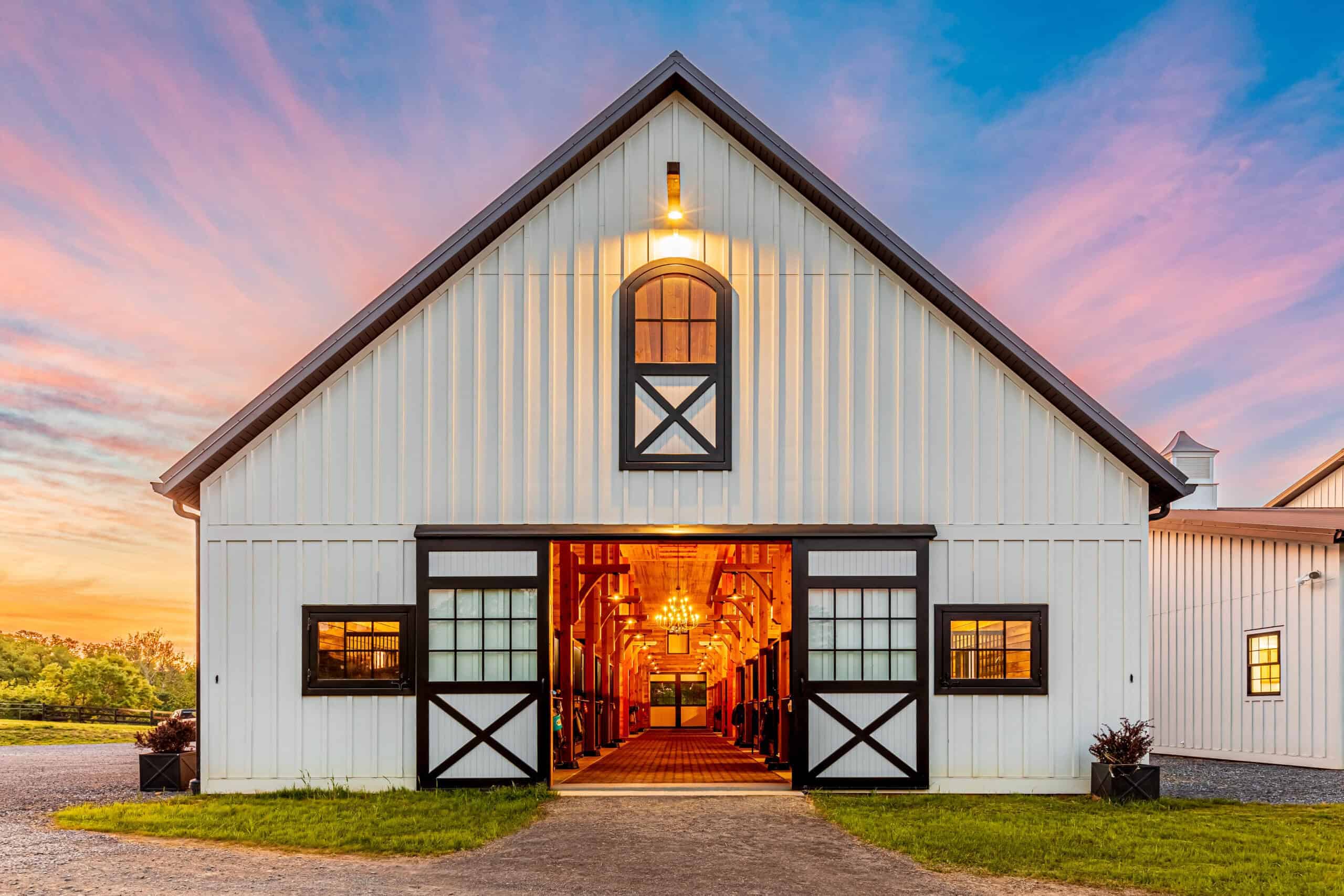 Spacious barn with elegant interior, perfect for events, showcasing Quarry View Building Group expertise.